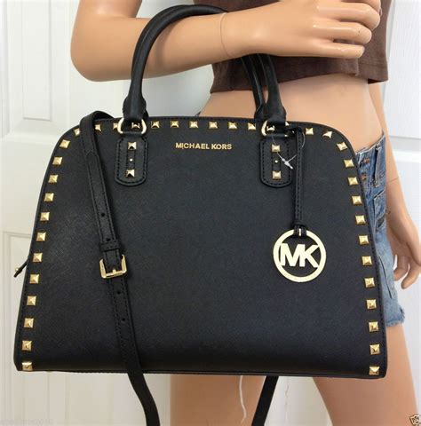 black and gold michael kors purse